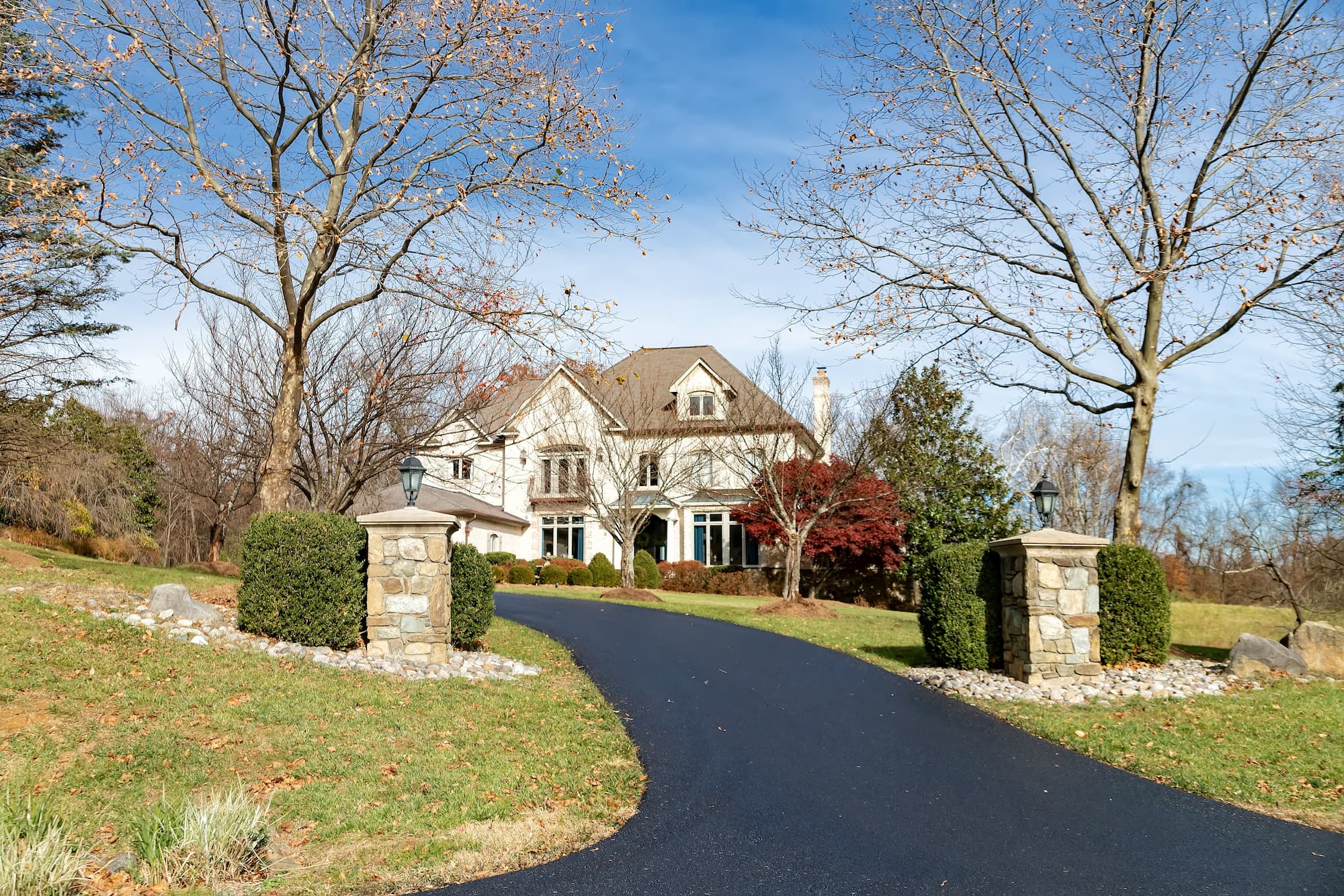 A Beautiful Home In Minnesota With An Asphalt Driveway